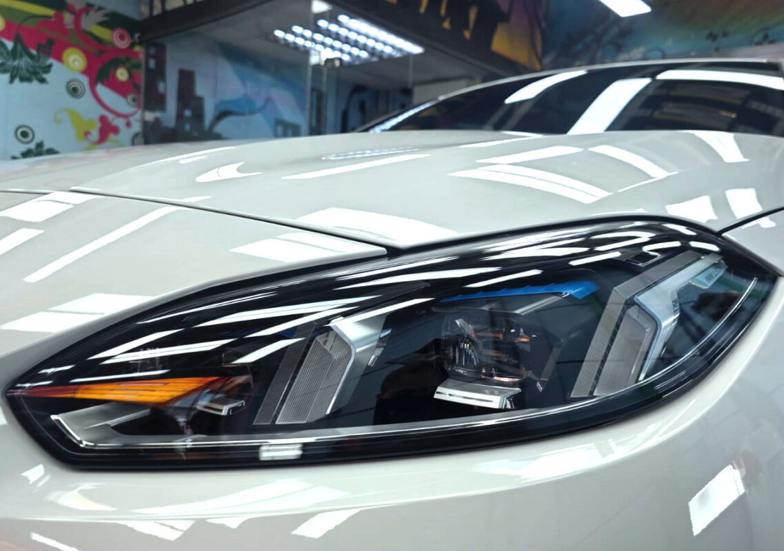 The 2 Series's coated paintwork showing clean reflections.