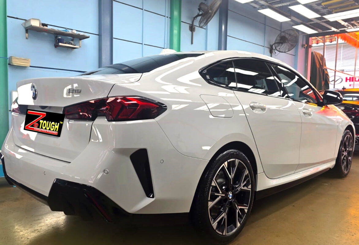 Rear quarter of the BMW 2 Series, glossy and protected.