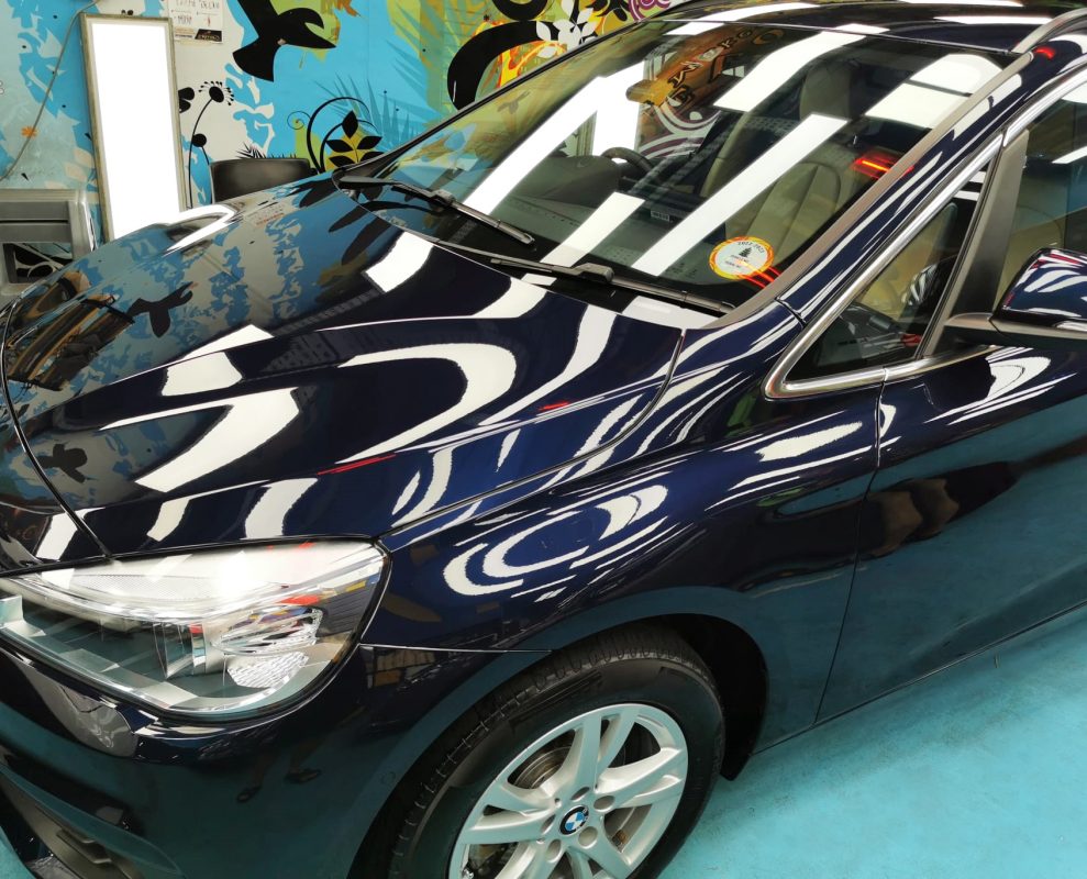 The BMW 2 Series from a side angle after the ceramic coating.