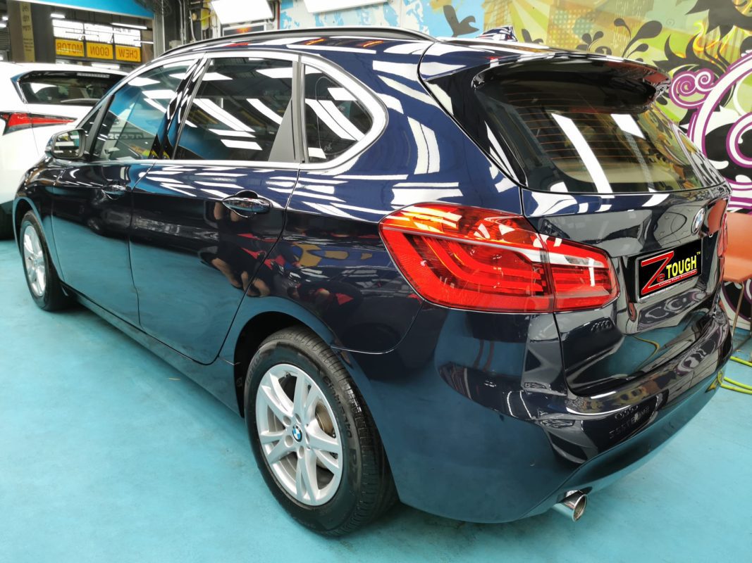 Rear quarter of the BMW 2 Series, glossy and protected.
