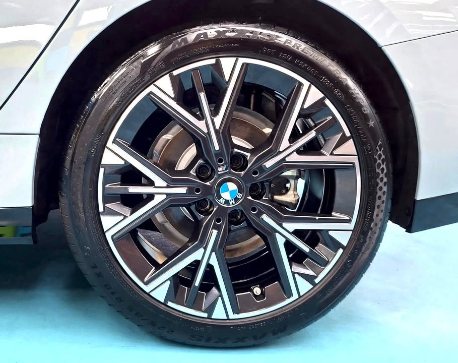 Two-tone multi-spoke alloy wheel on the grey BMW 2 Series.
