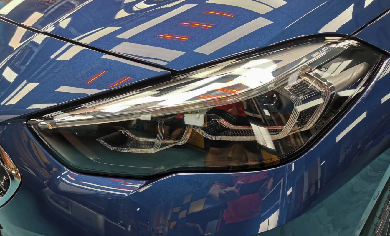 The 2 Series' coated paintwork showing clean reflections.