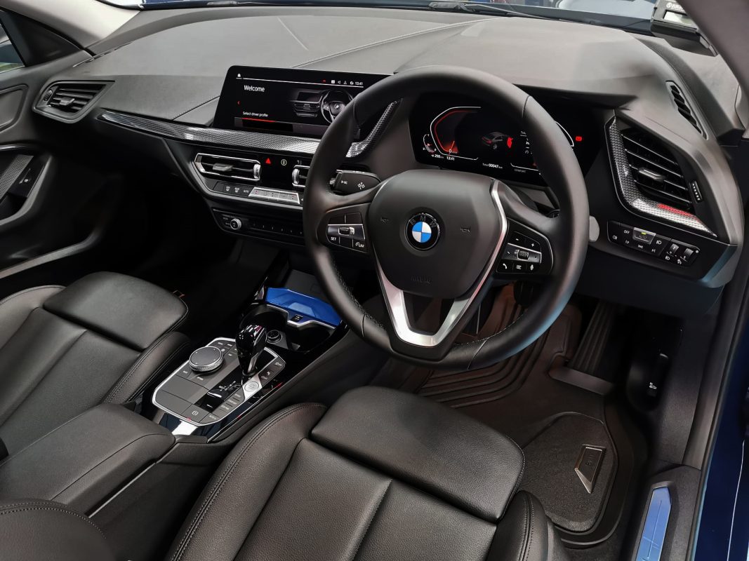 The BMW 2 Series parked in the workshop, freshly coated.