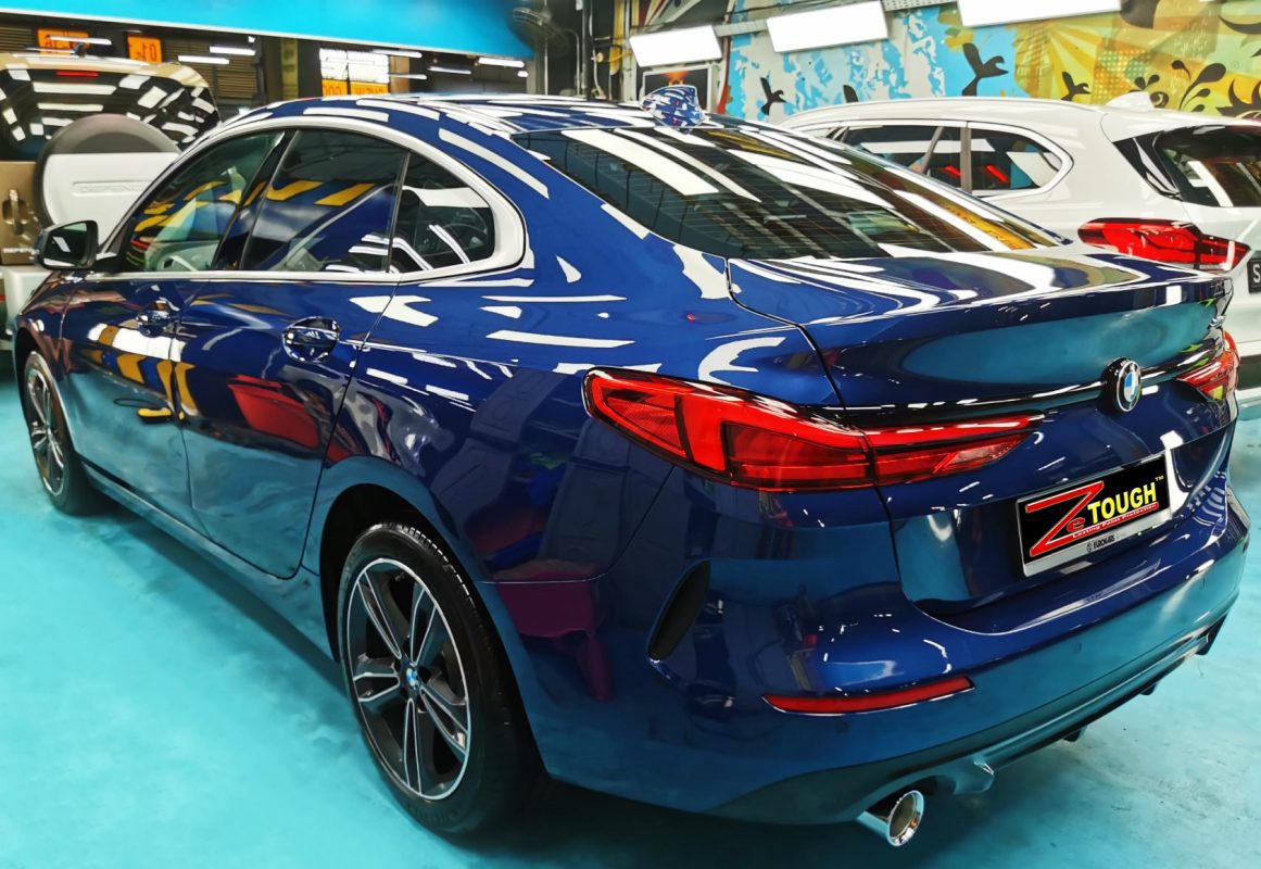 Rear quarter of the BMW 2 Series, glossy and protected.