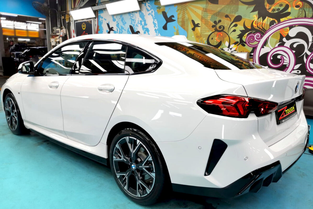 Rear quarter of the BMW 216 GC, glossy and protected.