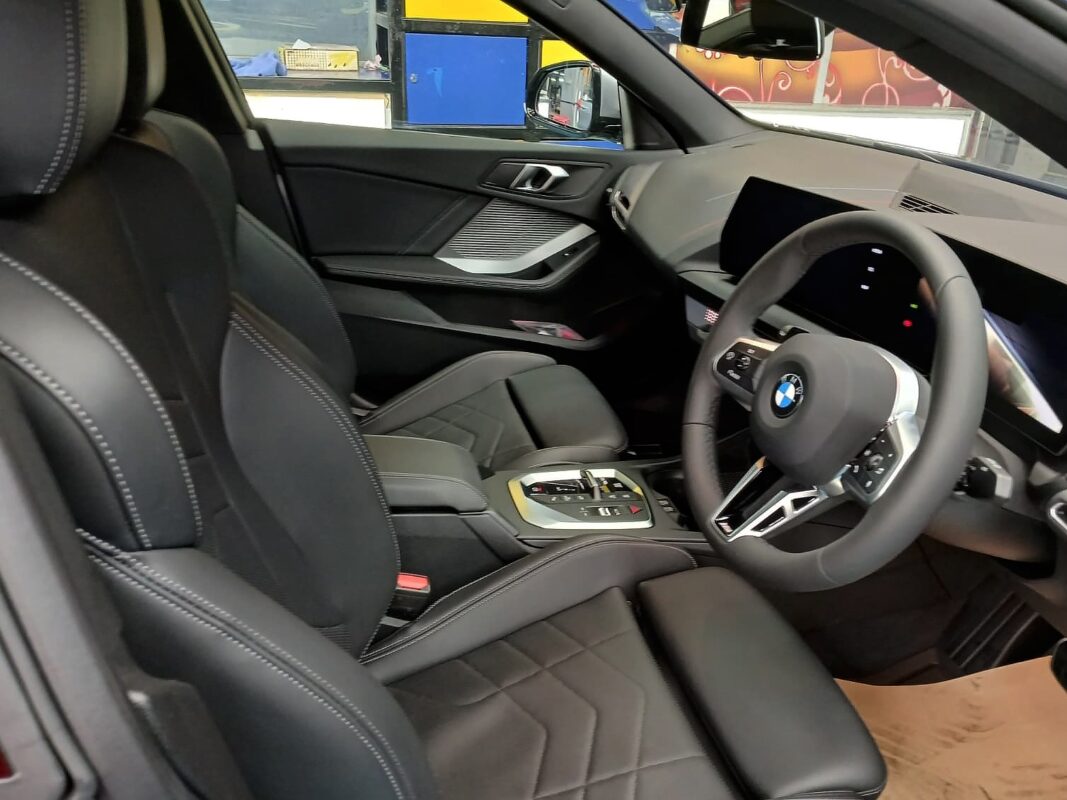 The BMW 216 GC parked in the workshop, freshly coated.