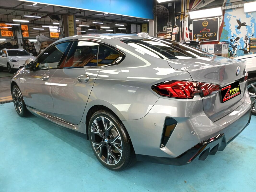 Rear quarter of the BMW 216 GC, glossy and protected.