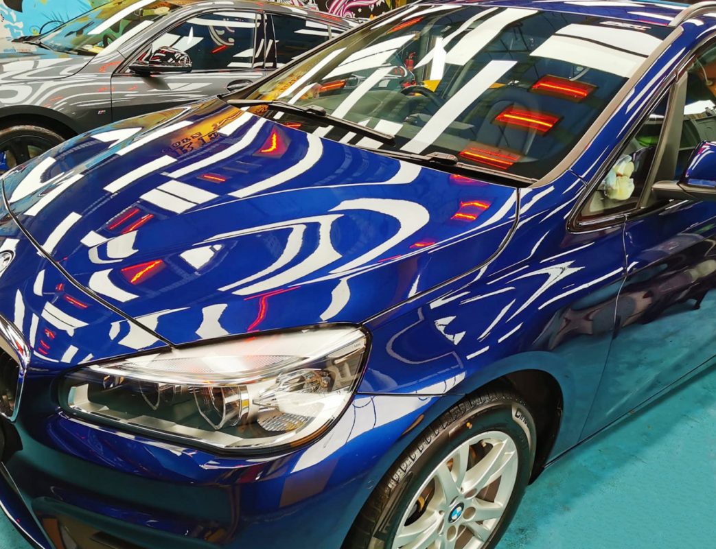 The BMW 216D Active Tourer from a side angle after the ceramic coating.