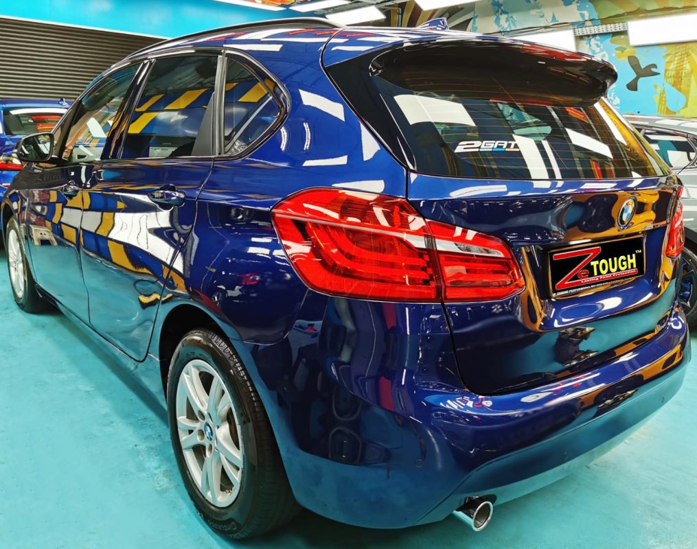 Rear quarter of the BMW 216D Active Tourer, glossy and protected.