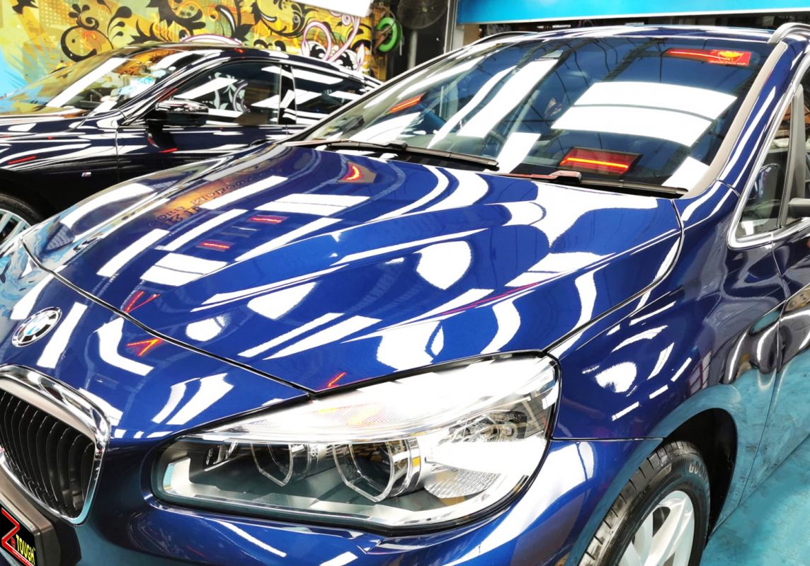 The BMW 216D from a side angle after the ceramic coating.