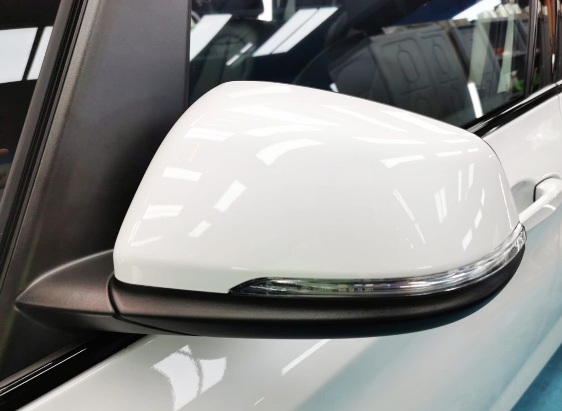 Side panel of the BMW 216D with the titanium finish locked in.