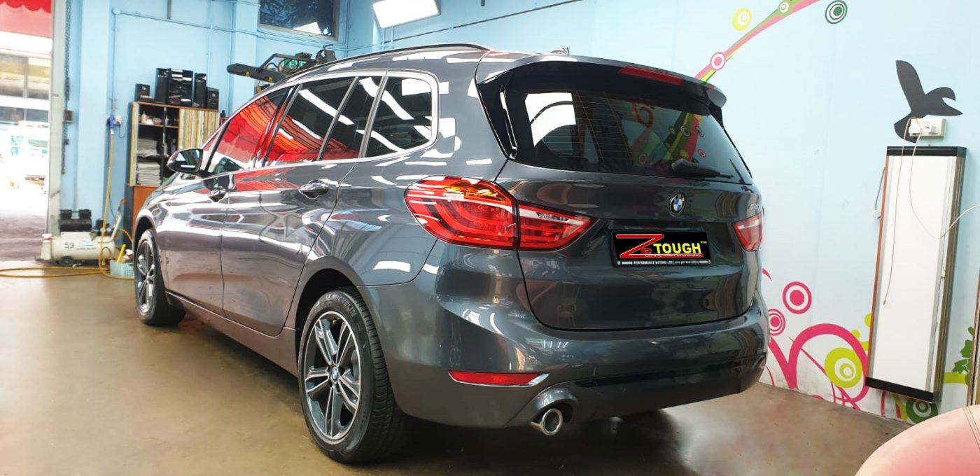 Rear quarter of the BMW 216GT, glossy and protected.