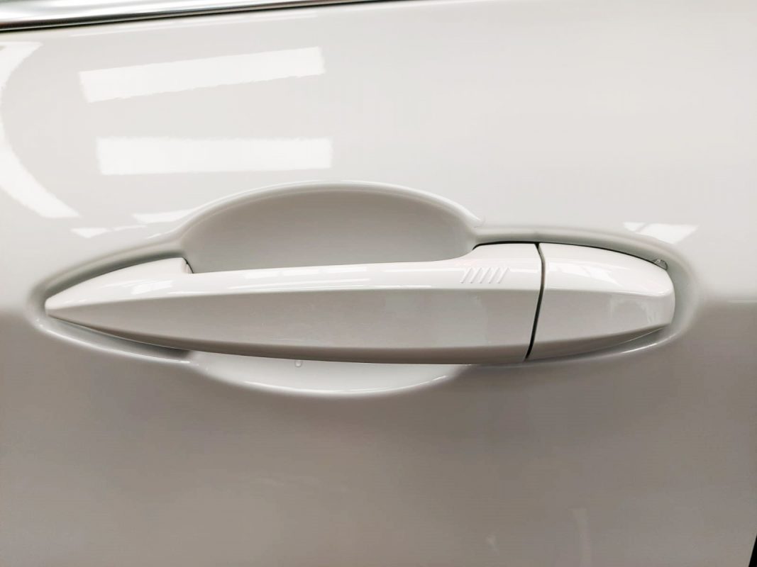Front three-quarter view of the BMW 216i after coating.