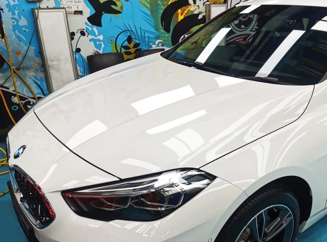 The BMW 216i from a side angle after the ceramic coating.