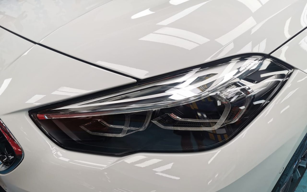 The 216i's coated paintwork showing clean reflections.