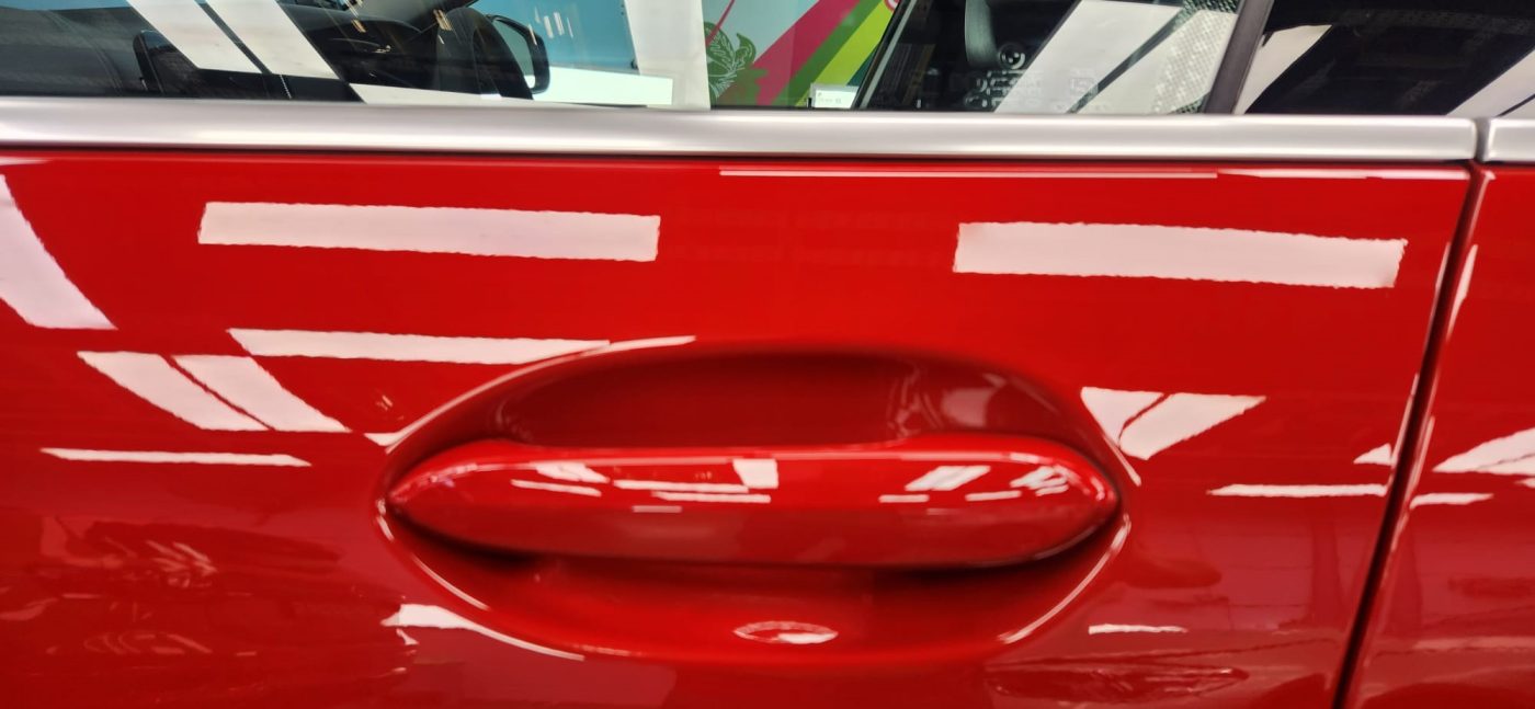Front three-quarter view of the BMW 216i GC after coating.