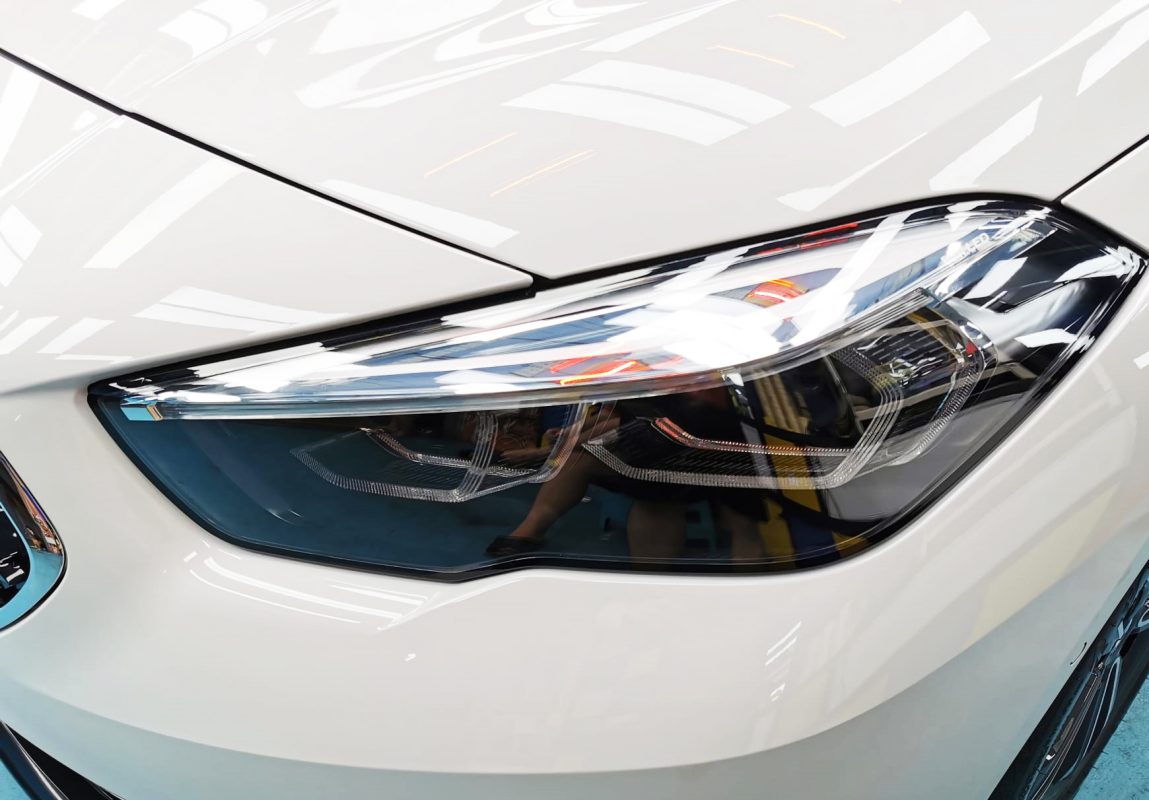 The 216i GC's coated paintwork showing clean reflections.