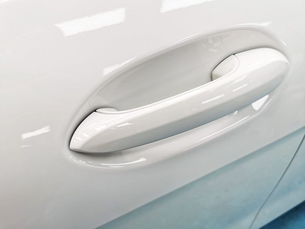 Front three-quarter view of the BMW 216i GC after coating.