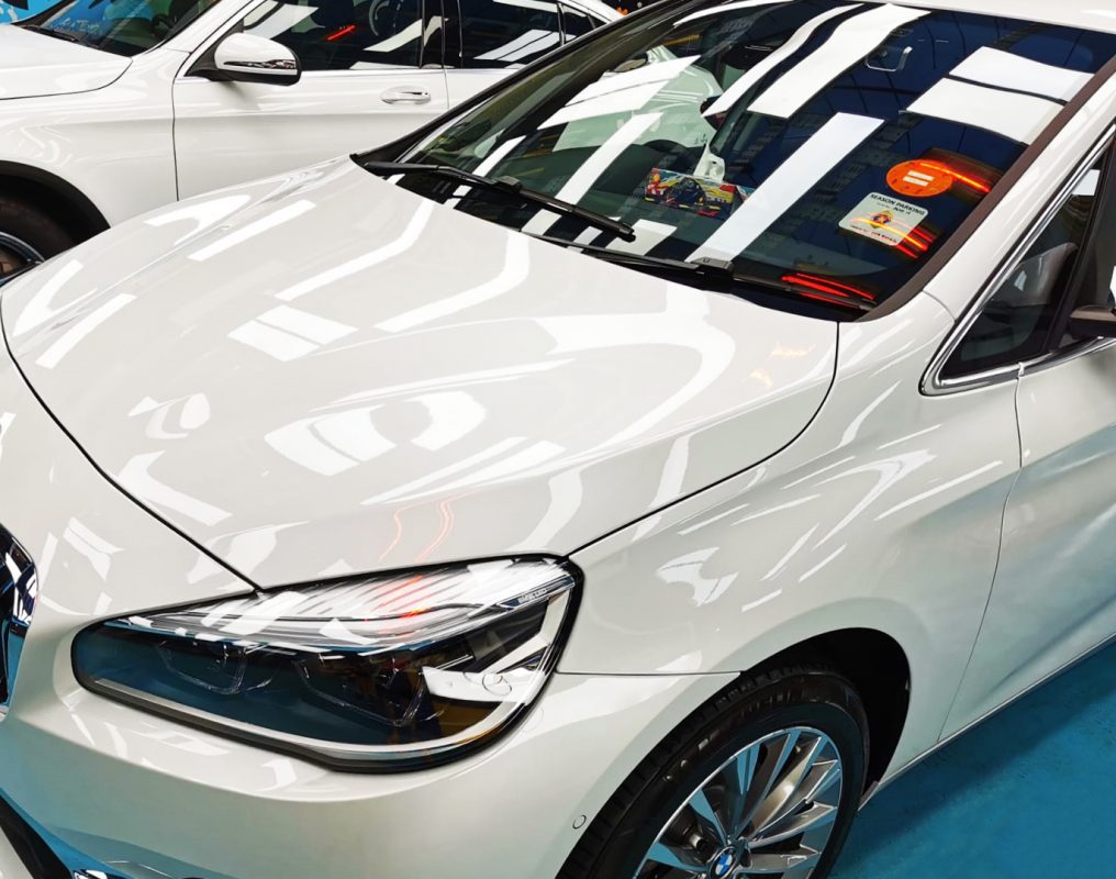 The BMW 216i Gran Tourer from a side angle after the ceramic coating.