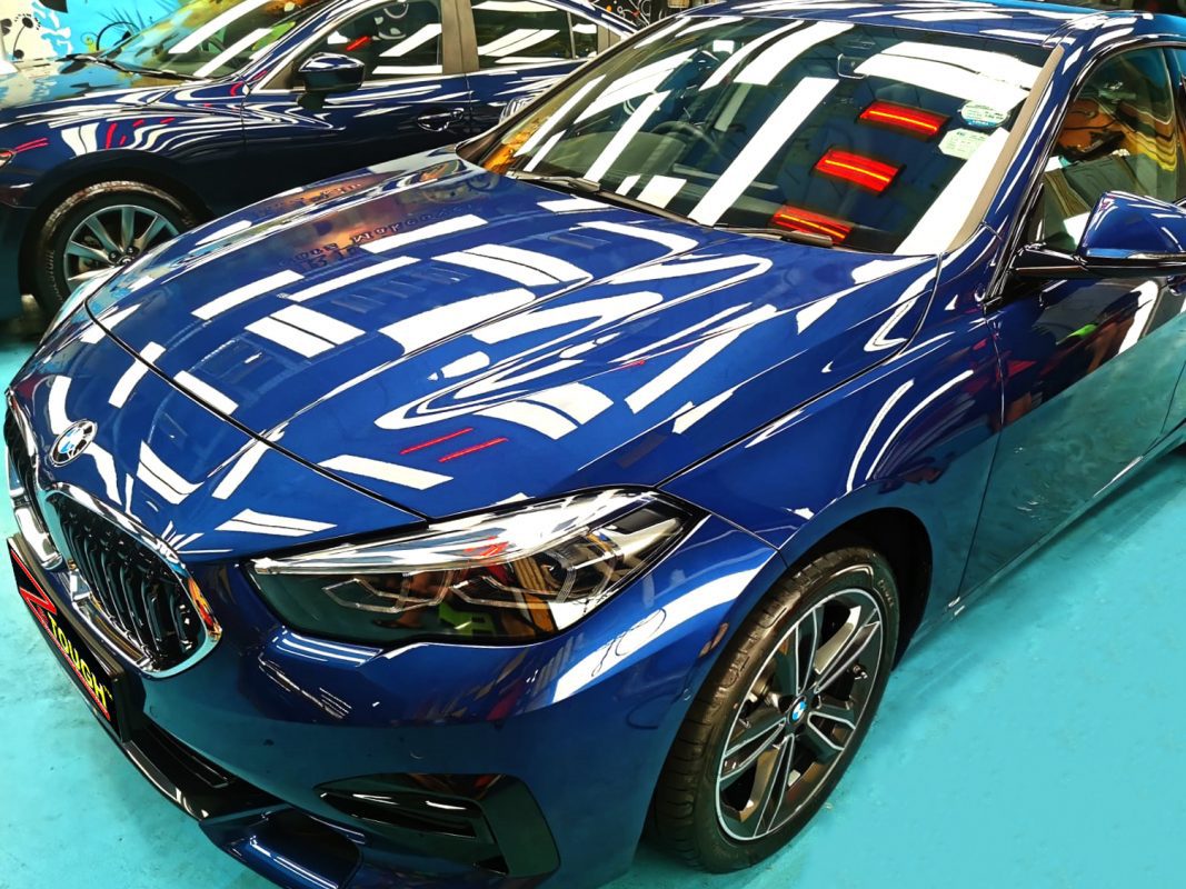 The BMW 216i from a side angle after the ceramic coating.