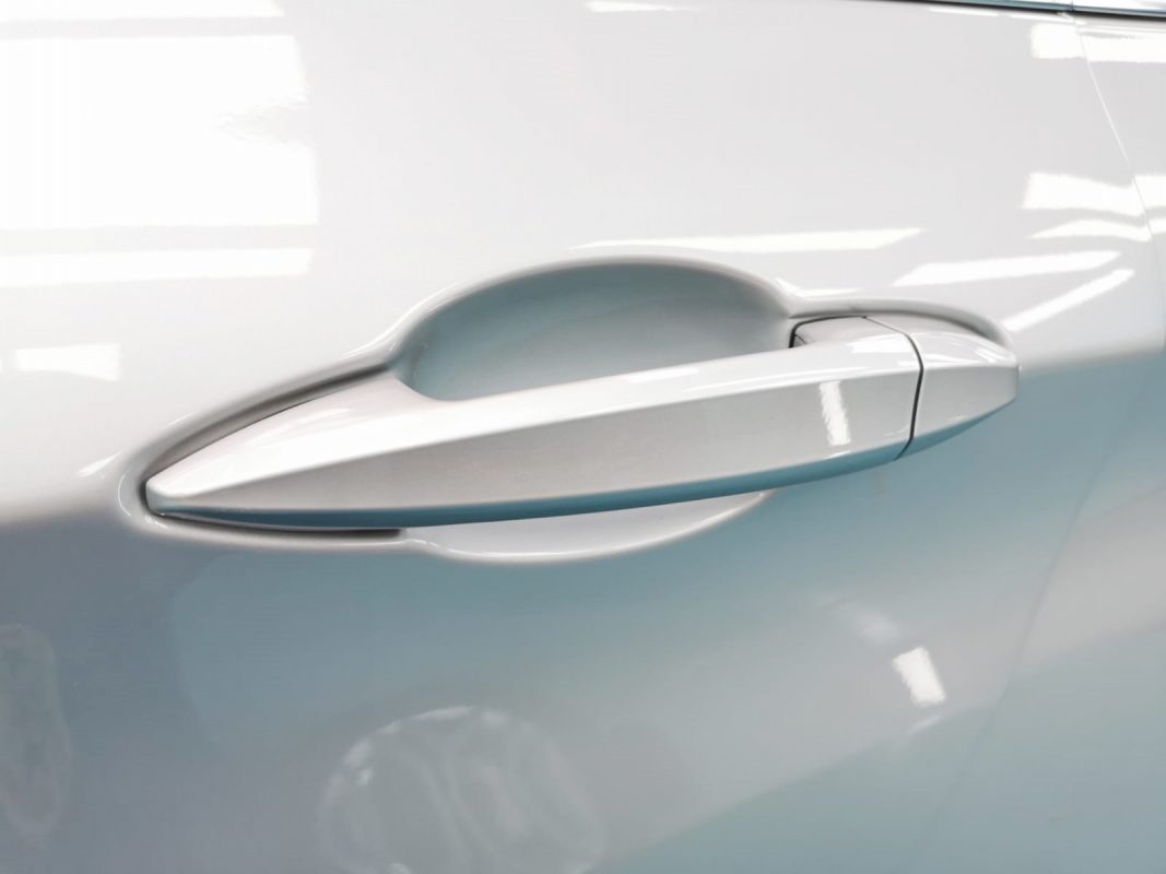 Front three-quarter view of the BMW 216i after coating.