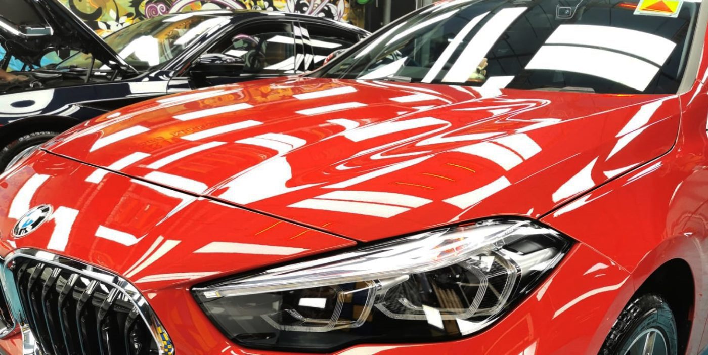The BMW 216i from a side angle after the titanium coating.