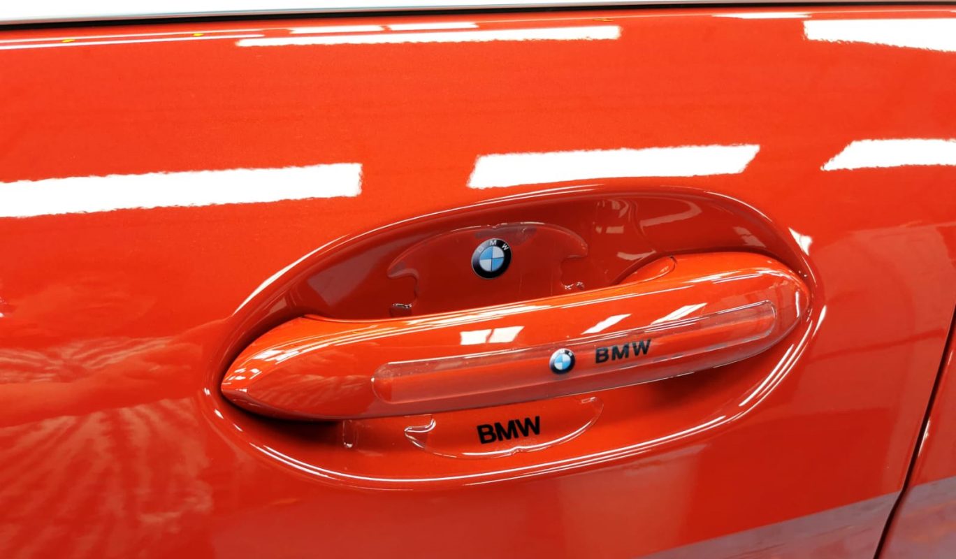 Front three-quarter view of the BMW 216i after coating.
