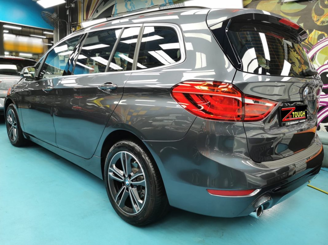 Rear quarter of the BMW 218, glossy and protected.