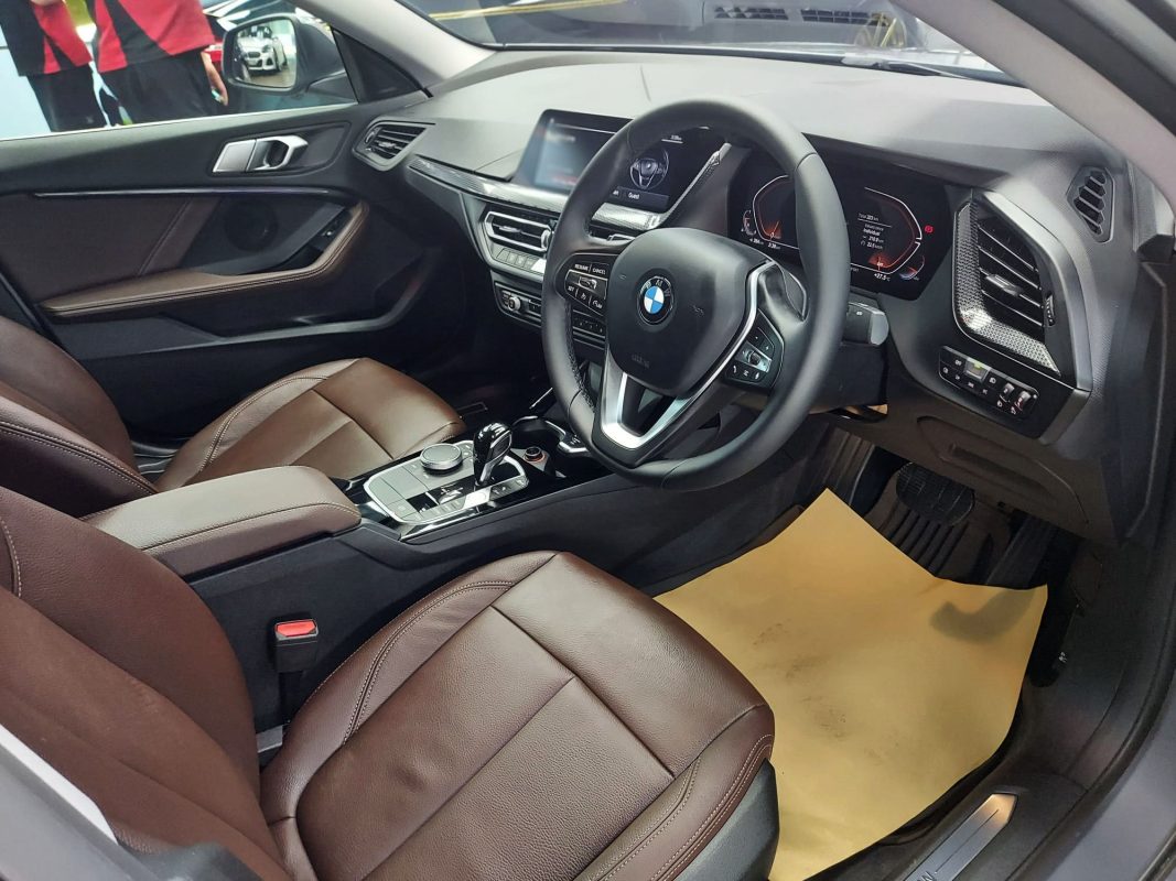 The BMW 218i GC parked in the workshop, freshly coated.