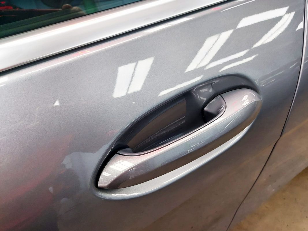 Front three-quarter view of the BMW 218i GC after coating.