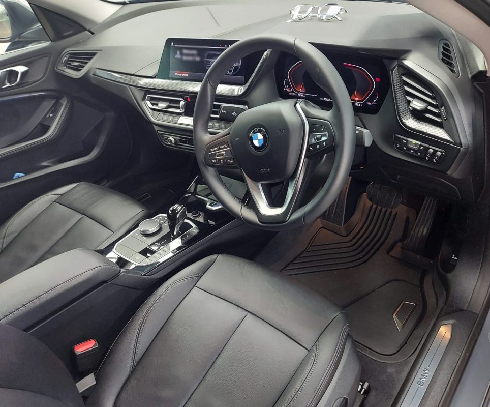 The BMW 218i GC parked in the workshop, freshly coated.