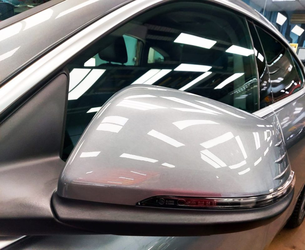 Side panel of the BMW 218i GC with the titanium finish locked in.