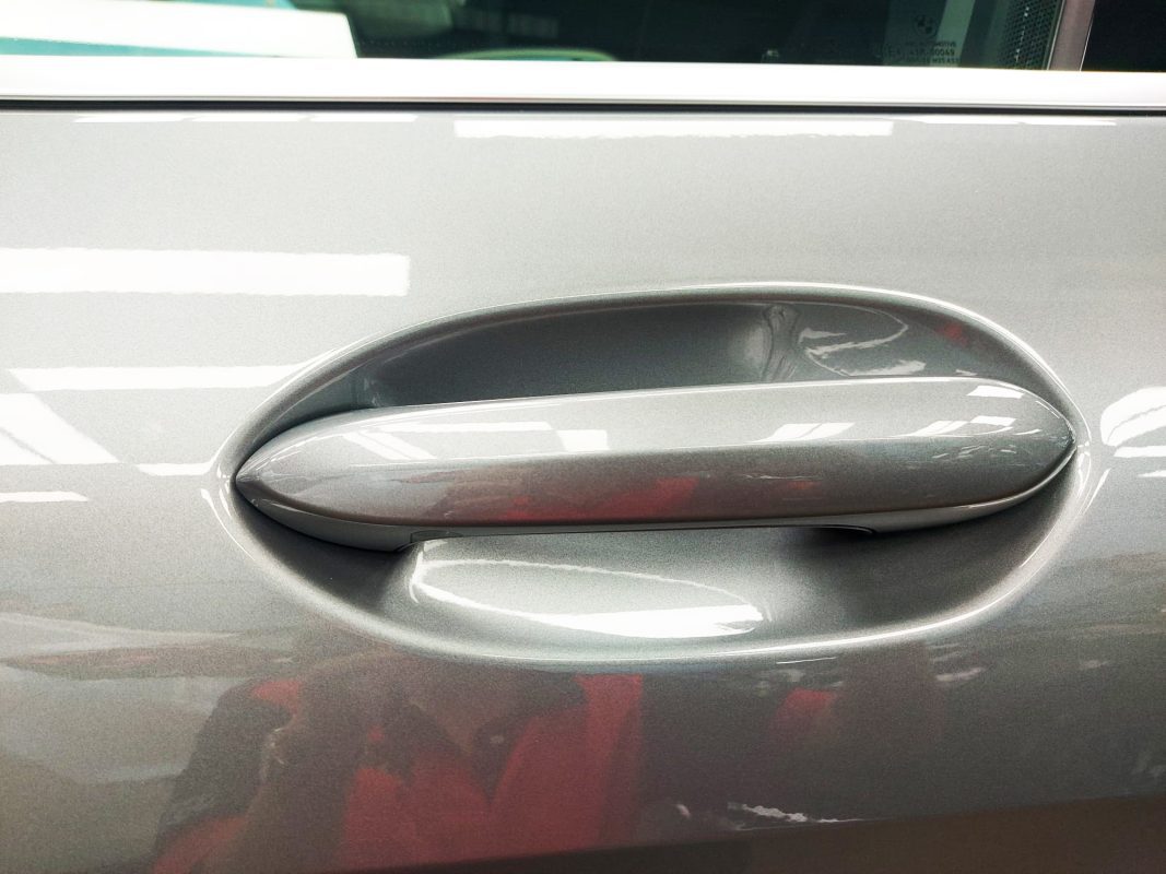 Front three-quarter view of the BMW 218i GC after coating.