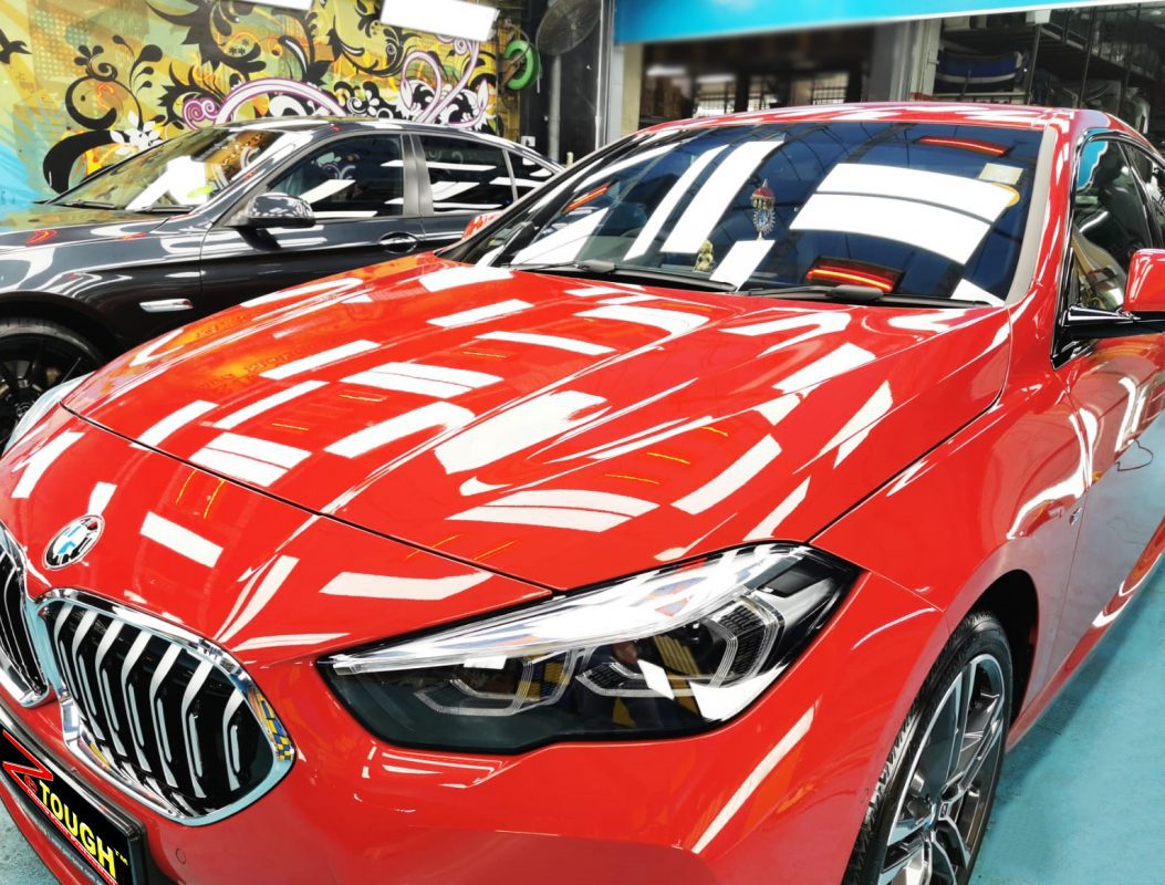 The BMW 218i from a side angle after the ceramic coating.