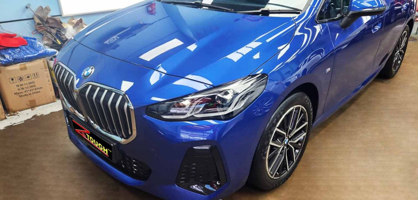 The BMW 218i from a side angle after the ceramic coating.