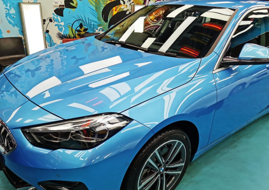 The BMW 218i from a side angle after the titanium coating.