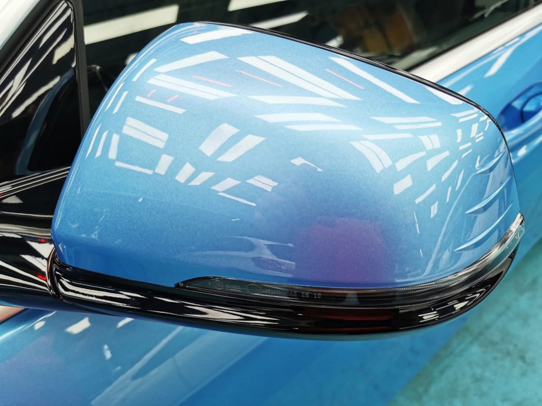 Side panel of the 218i with the titanium finish locked in.