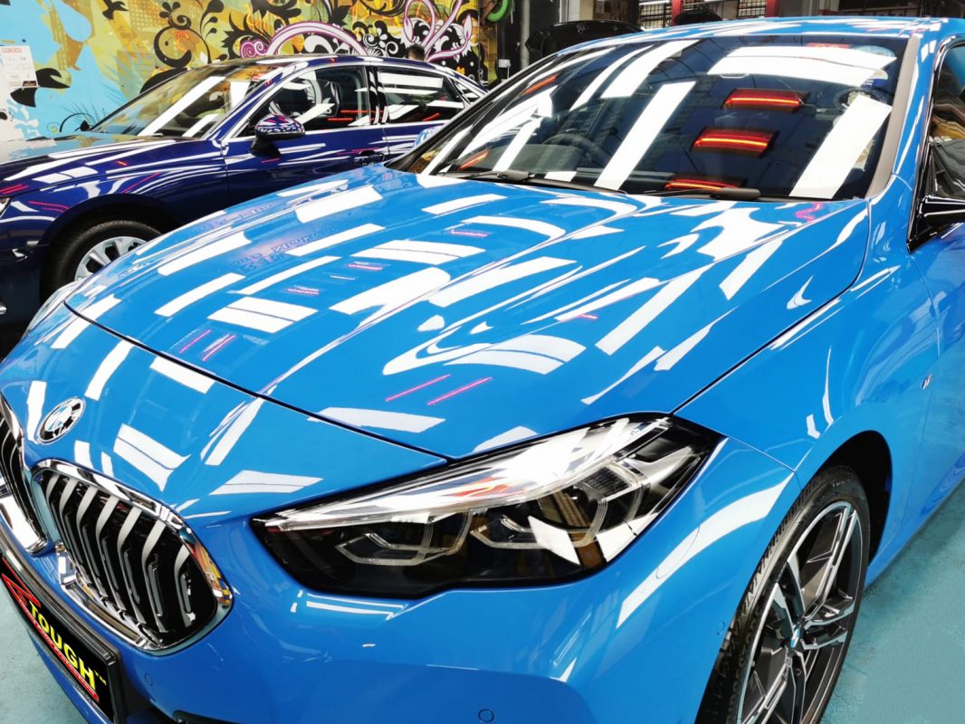 The BMW 218i from a side angle after the titanium coating.