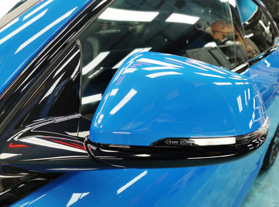 Side panel of the BMW 218i with the titanium finish locked in.
