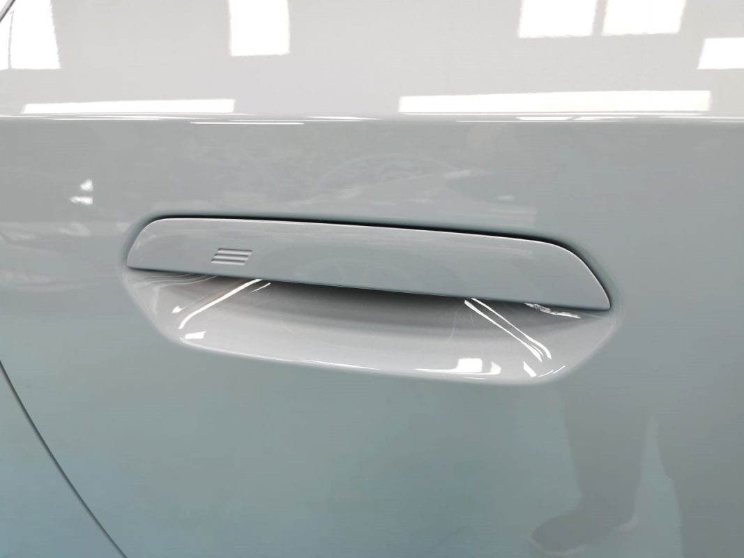 Front three-quarter view of the BMW 220i after coating.