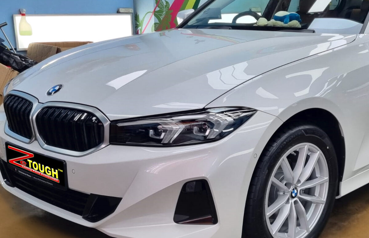 The BMW 3 Series from a side angle after the ceramic coating.