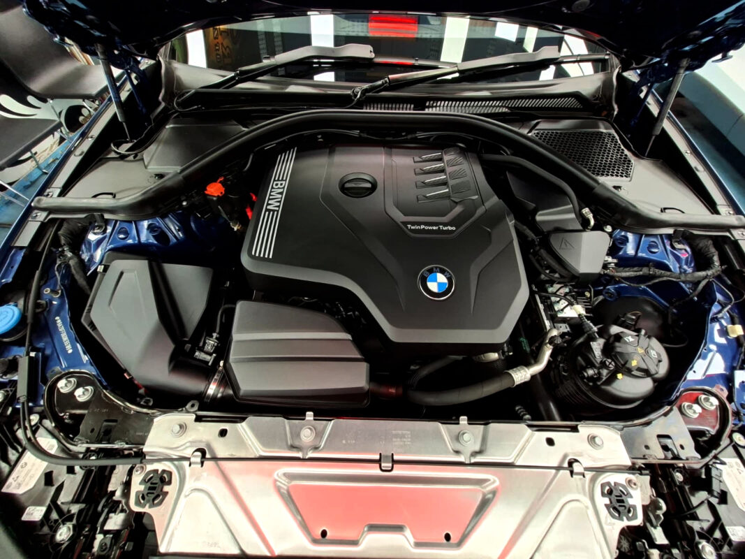 The BMW 3 Series parked in the workshop, freshly coated.