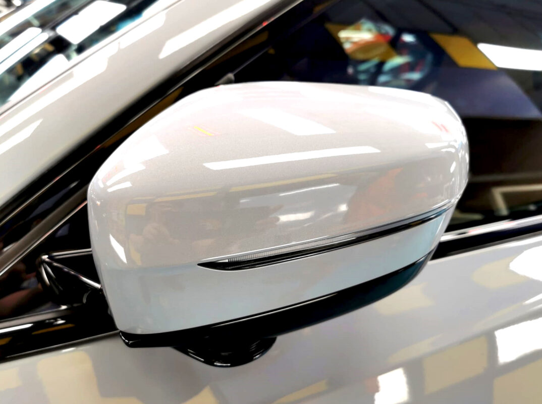 Side panel of the BMW 3 Series with the titanium finish locked in.