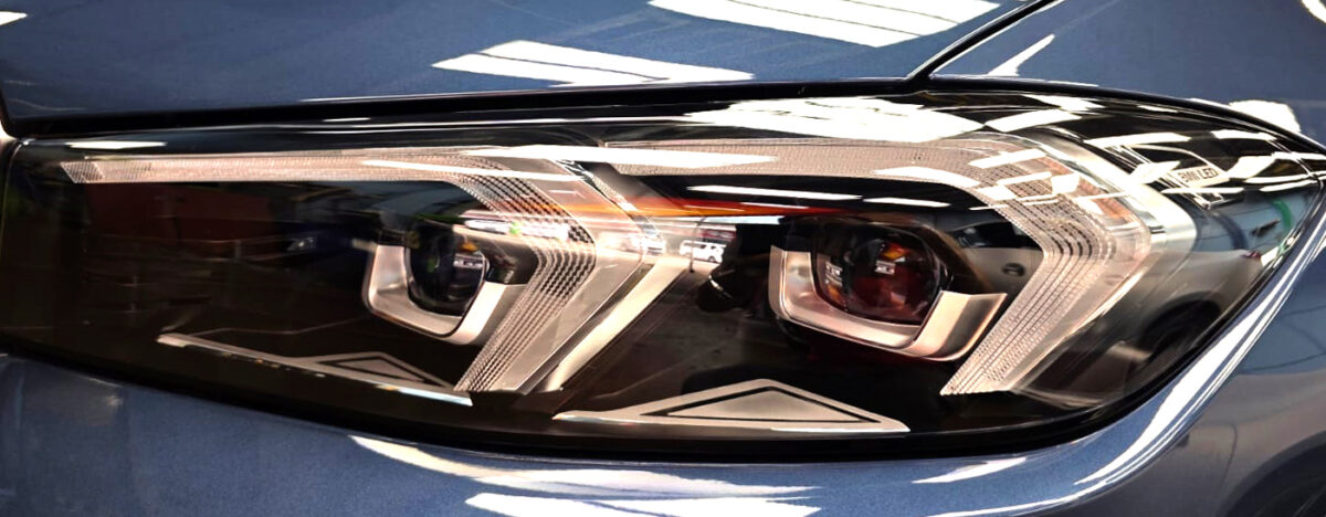 The 3 Series' coated paintwork showing clean reflections.