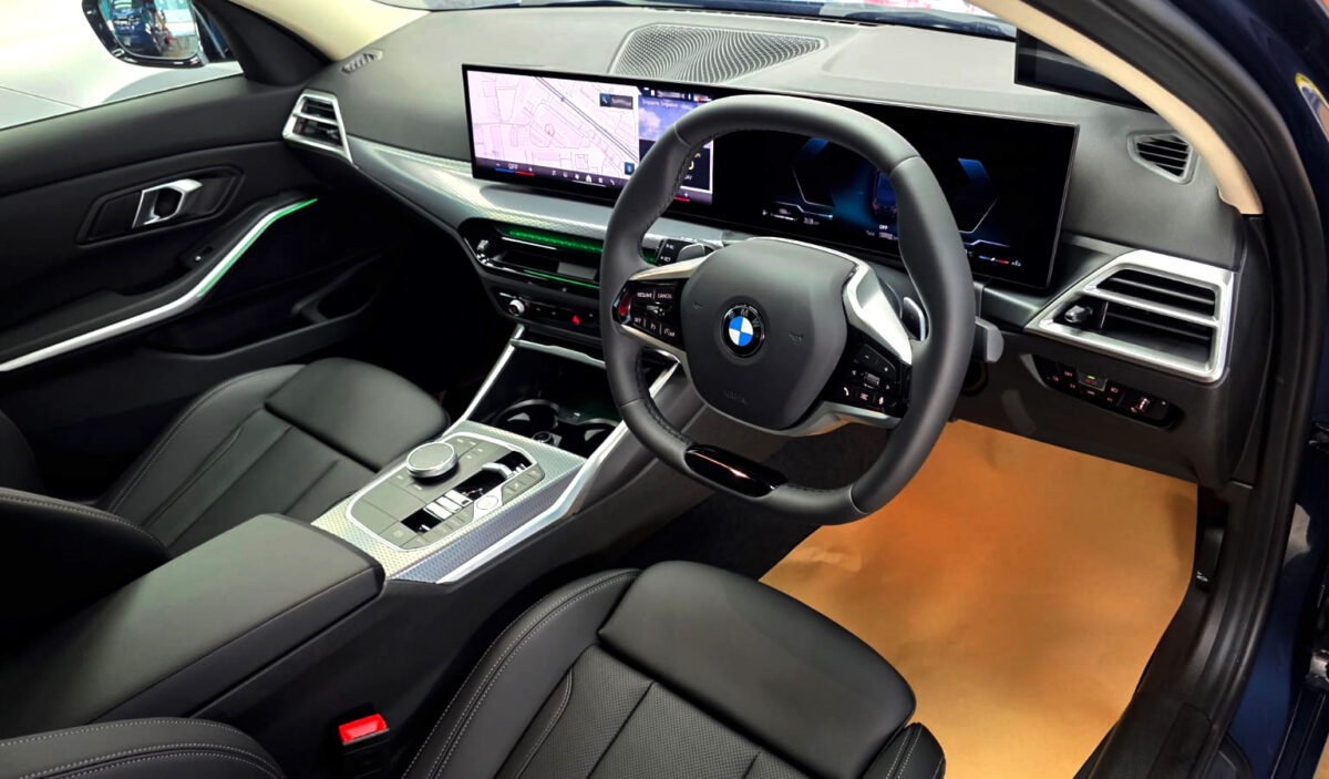 The BMW 3 Series parked in the workshop, freshly coated.