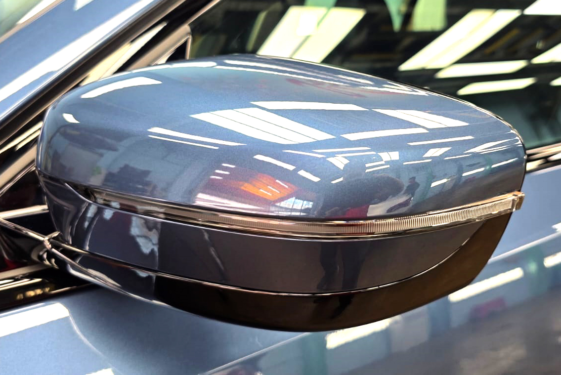 Side panel of the BMW 3 Series with the titanium finish locked in.