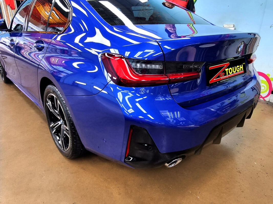 The BMW 3 Series parked in the workshop, freshly coated.