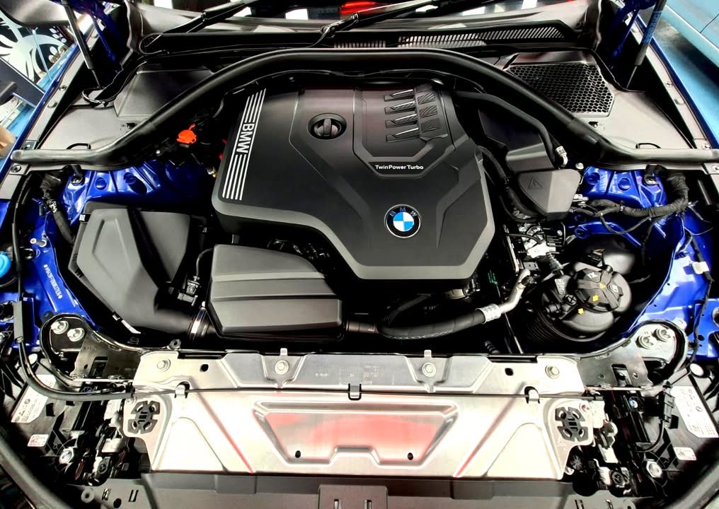 View of the engine bay with the bonnet open.