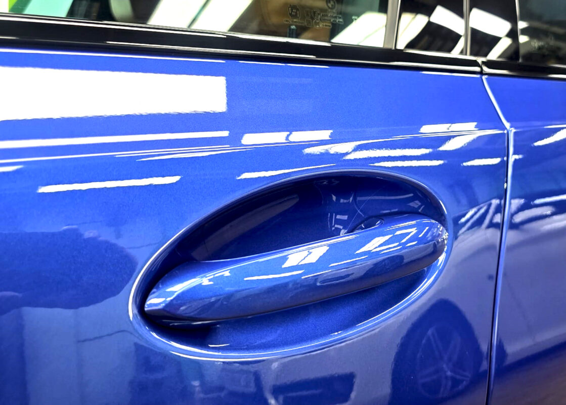 The coated paintwork of the BMW 3 Series, clean and sharp.