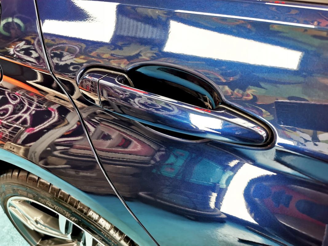 Front three-quarter view of the BMW 316i after coating.